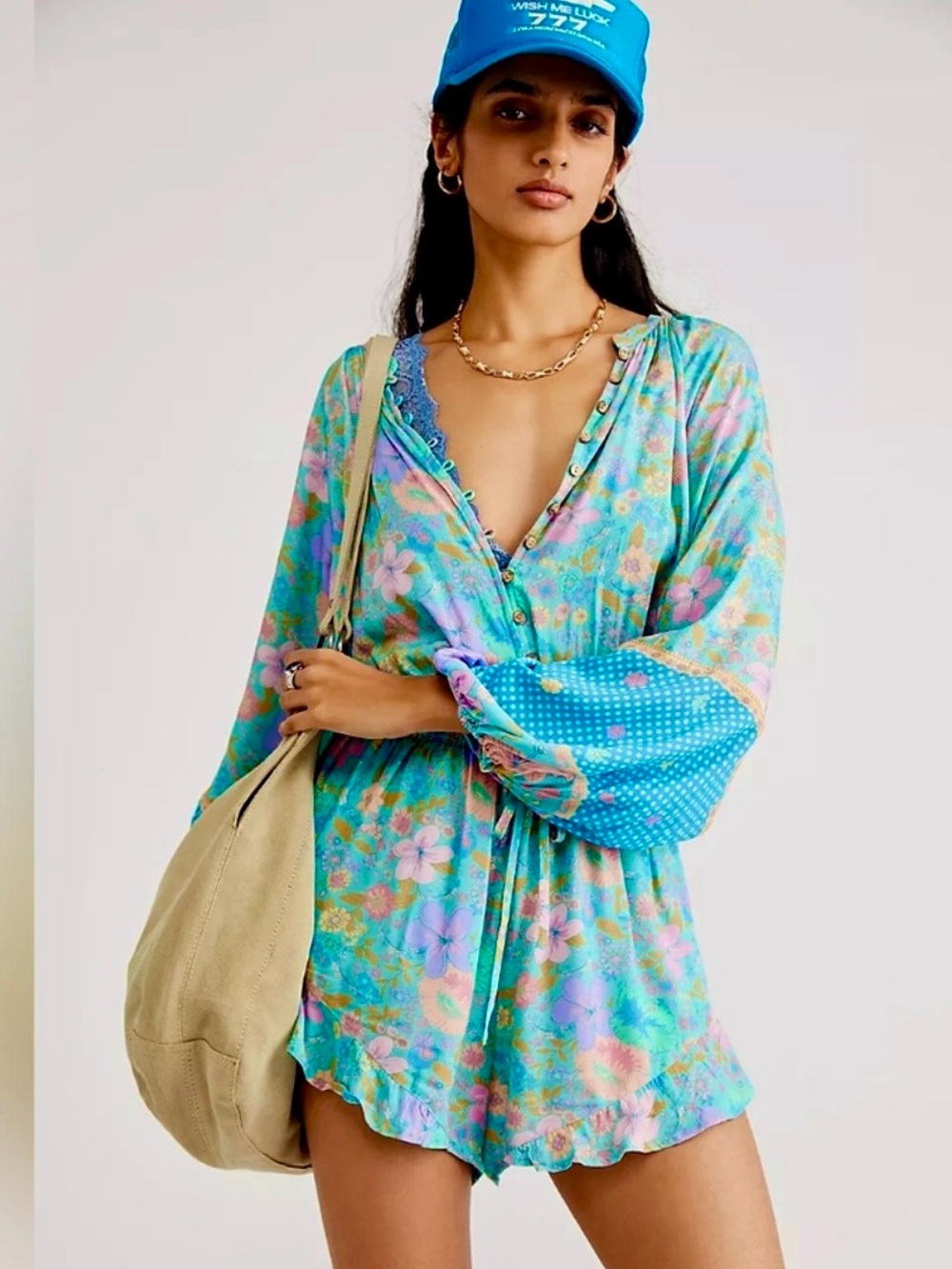 Spell romper , size M